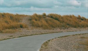 Preview wallpaper road, turn, grass, hill, roadside