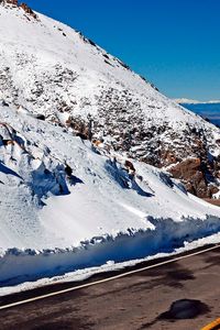 Preview wallpaper road, turn, lines, yellow, asphalt, mountains, snow