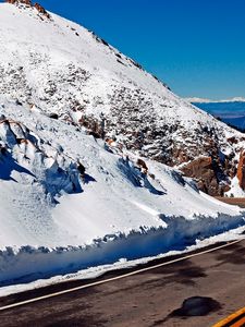 Preview wallpaper road, turn, lines, yellow, asphalt, mountains, snow