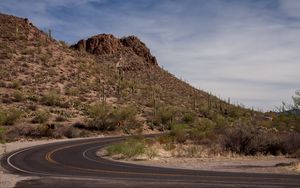 Preview wallpaper road, turn, mountain, slope, desert, landscape