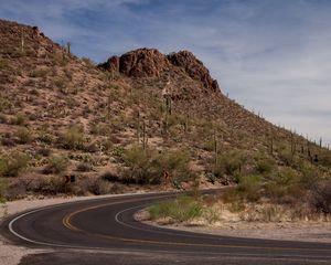 Preview wallpaper road, turn, mountain, slope, desert, landscape