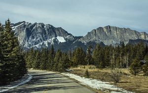 Preview wallpaper road, turn, mountains, trees, snow, nature