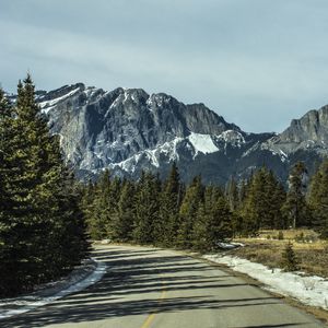Preview wallpaper road, turn, mountains, trees, snow, nature