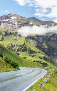 Preview wallpaper road, turn, mountains, relief, clouds, grass