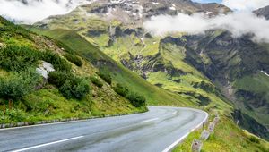 Preview wallpaper road, turn, mountains, relief, clouds, grass