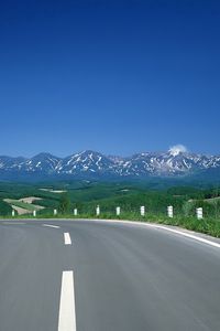 Preview wallpaper road, turn, mountains, asphalt, tops