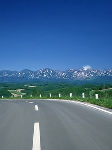 Preview wallpaper road, turn, mountains, asphalt, tops