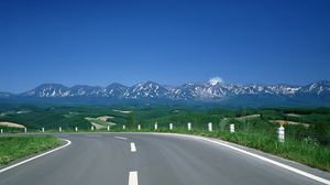 Preview wallpaper road, turn, mountains, asphalt, tops