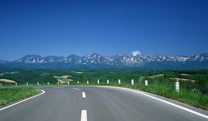 Preview wallpaper road, turn, mountains, asphalt, tops