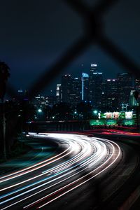 Preview wallpaper road, turn, night city, buildings, lights, long exposure