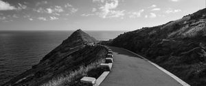 Preview wallpaper road, turn, rocks, mountains, black and white