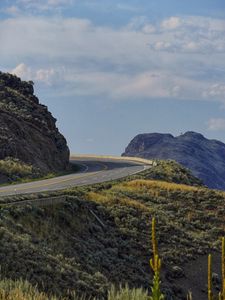 Preview wallpaper road, turn, rocks, hills