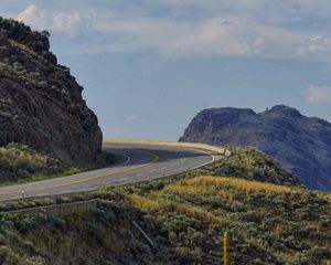 Preview wallpaper road, turn, rocks, hills