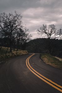 Preview wallpaper road, turn, stripes, trees, hills, nature