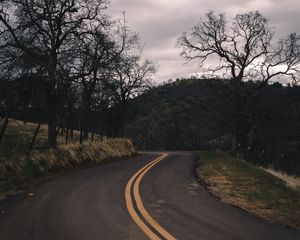 Preview wallpaper road, turn, stripes, trees, hills, nature