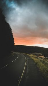 Preview wallpaper road, turn, sunset, trees, sky, clouds