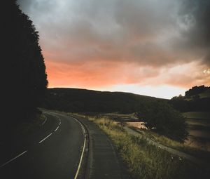 Preview wallpaper road, turn, sunset, trees, sky, clouds