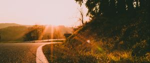 Preview wallpaper road, turn, sunset, sunlight, nature