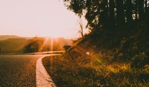 Preview wallpaper road, turn, sunset, sunlight, nature