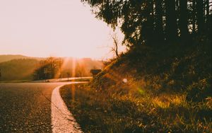Preview wallpaper road, turn, sunset, sunlight, nature