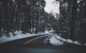Preview wallpaper road, turn, trees, snow, asphalt