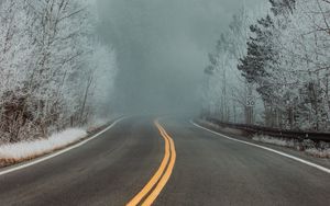 Preview wallpaper road, turn, trees, fog, snow, winter