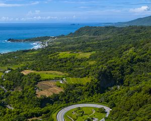 Preview wallpaper road, turn, trees, sea, nature