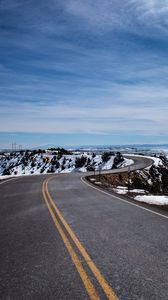 Preview wallpaper road, turn, winding, asphalt, horizon, snowy