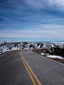Preview wallpaper road, turn, winding, asphalt, horizon, snowy