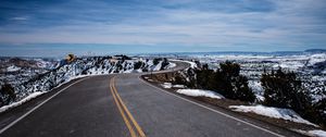 Preview wallpaper road, turn, winding, asphalt, horizon, snowy