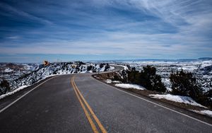 Preview wallpaper road, turn, winding, asphalt, horizon, snowy