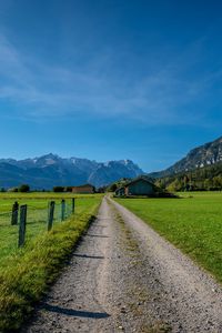 Preview wallpaper road, valley, houses, mountains
