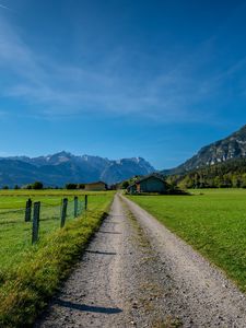 Preview wallpaper road, valley, houses, mountains