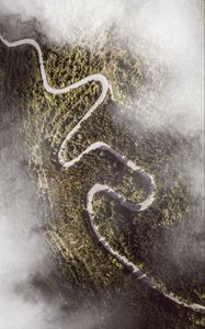 Preview wallpaper road, winding, aerial view, mountains, forest, clouds