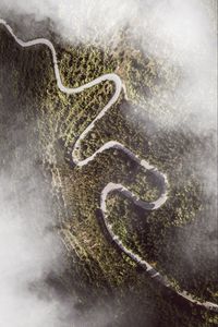 Preview wallpaper road, winding, aerial view, mountains, forest, clouds