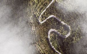 Preview wallpaper road, winding, aerial view, mountains, forest, clouds