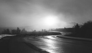 Preview wallpaper road, winding, bw, fog