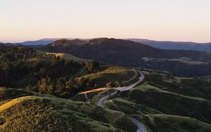 Preview wallpaper road, winding, hills, trees