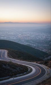 Preview wallpaper road, winding, marking, distance, city