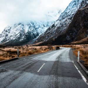 Preview wallpaper road, winding, mountains, marking, snowy