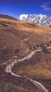 Preview wallpaper road, winding, mountains, snowy, slope