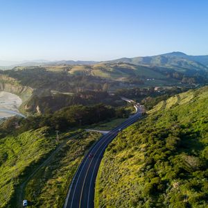 Preview wallpaper road, winding, relief, hills, distance