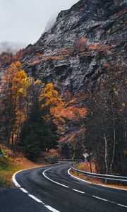 Preview wallpaper road, winding, rocks, marking, fog