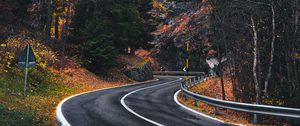 Preview wallpaper road, winding, rocks, marking, fog