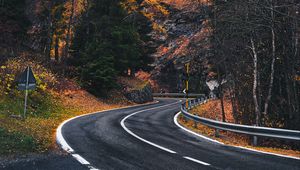 Preview wallpaper road, winding, rocks, marking, fog