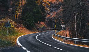 Preview wallpaper road, winding, rocks, marking, fog