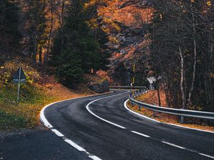 Preview wallpaper road, winding, rocks, marking, fog