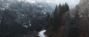 Preview wallpaper road, winding, trees, mountains, snowy