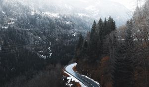 Preview wallpaper road, winding, trees, mountains, snowy