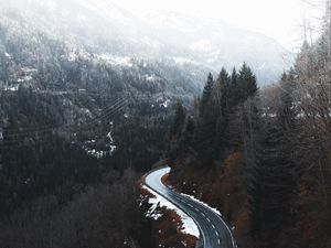 Preview wallpaper road, winding, trees, mountains, snowy